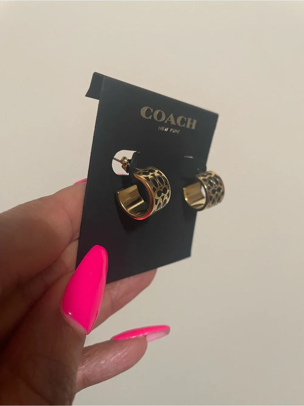 Coach gold tone